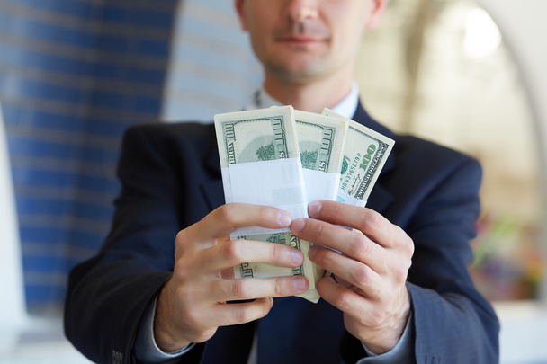 Dollars in businessman hands - Fotoğraf, Görsel
