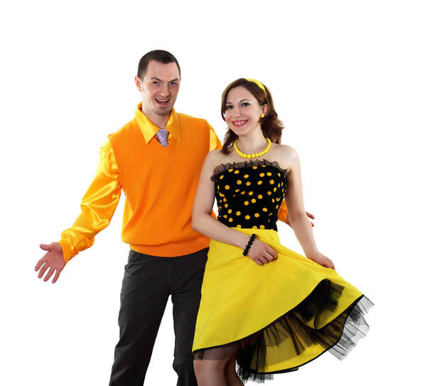 Young dancing couple in bright colour wear - Fotó, kép