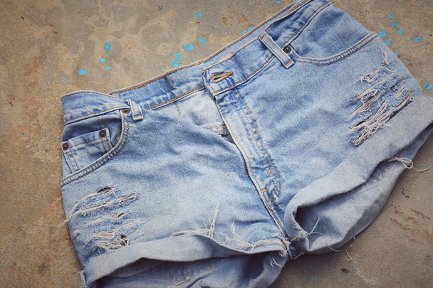 Pantalones vaqueros rasgados azules
 - Foto, Imagen