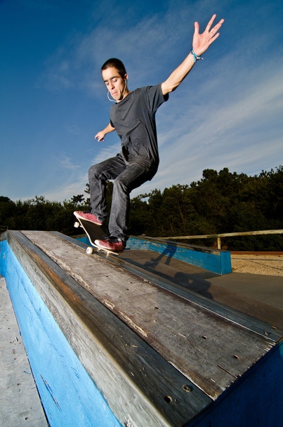 Skateboarder on a grind - Fotoğraf, Görsel