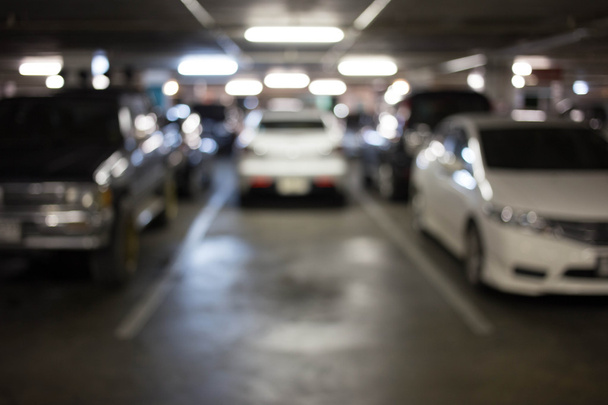 Blur image, Underground parking with car - Photo, image