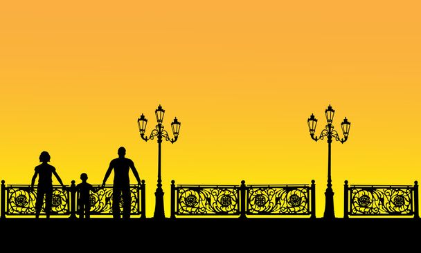 family near fence at sunset - Vector, Image