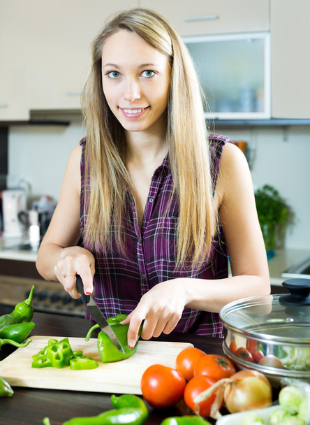 happy girl cooking with vegetables - 写真・画像