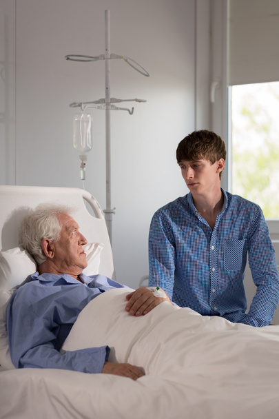 Elder patient talking to grandson - Foto, immagini