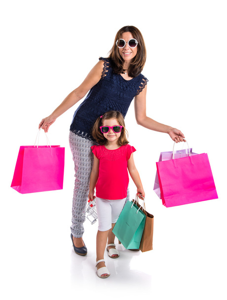 Мати і дочка з багатьма сумками для покупок
 - Фото, зображення
