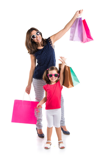 Mother and daughter with many shopping bags - Foto, imagen