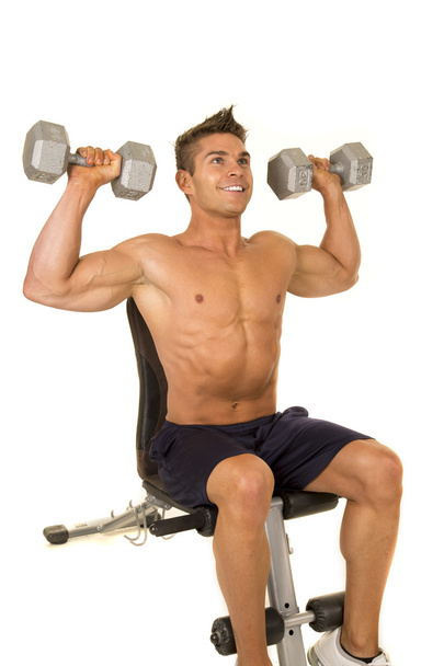 strong man exercising with dumbbells - Foto, Bild