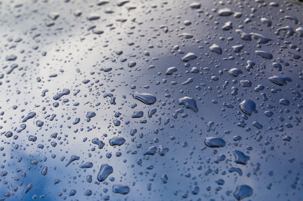 drops of water on the car - Foto, afbeelding