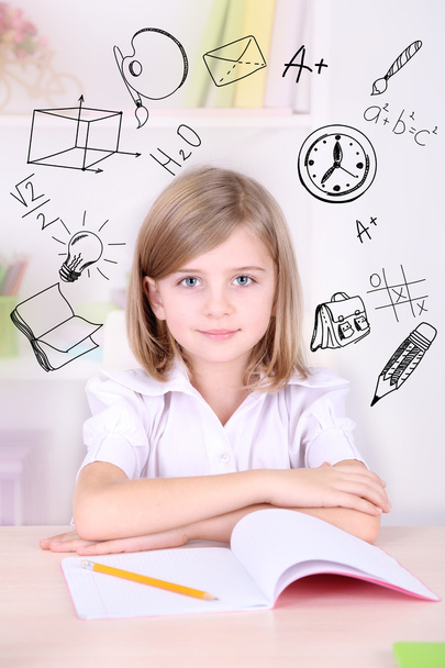 Little schoolgirl  with school  icons - Foto, Imagem