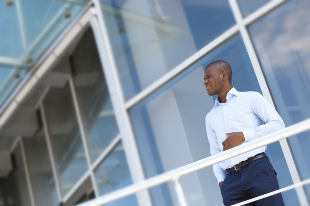 Handsome African American businessman near business centre - Zdjęcie, obraz