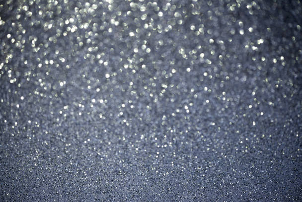 abstract glitter silver bokeh lights. defocused lights background. - Photo, Image