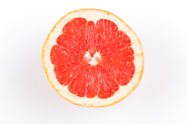 slice of grapefruit isolated on white background - Foto, Imagen