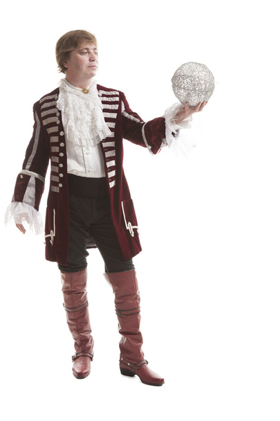 uomo in abiti medievali con palla decorativa
 - Foto, immagini