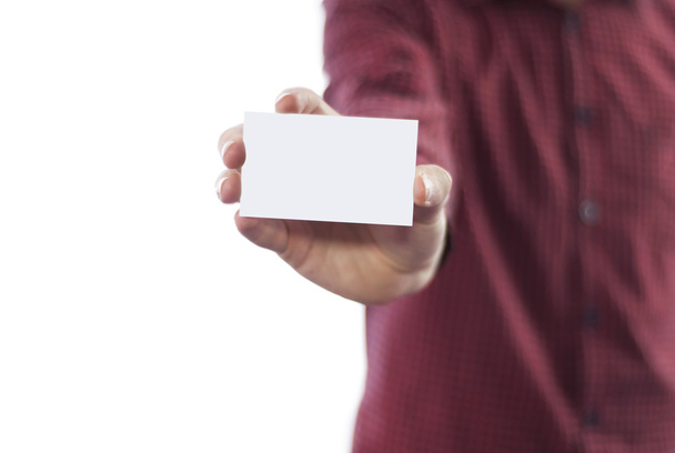 Homem segurando cartão de visita isolado no branco
 - Foto, Imagem