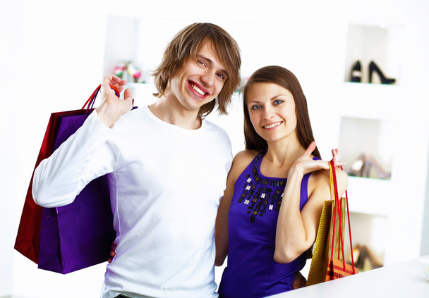 Young couple doing shopping together - Valokuva, kuva