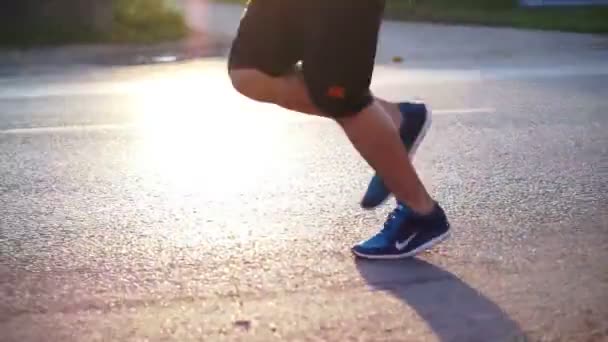 marathon runners in the morning sun, healthy exercise concept - Filmmaterial, Video