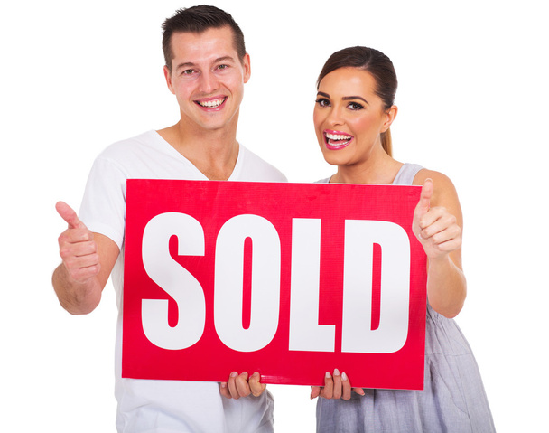 couple holding sold sign - Photo, Image
