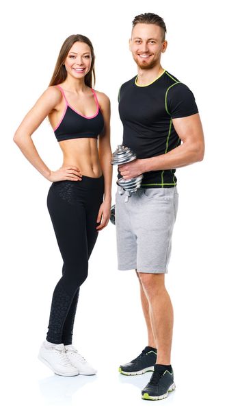 atletische man en vrouw met halters op de witte - Foto, afbeelding