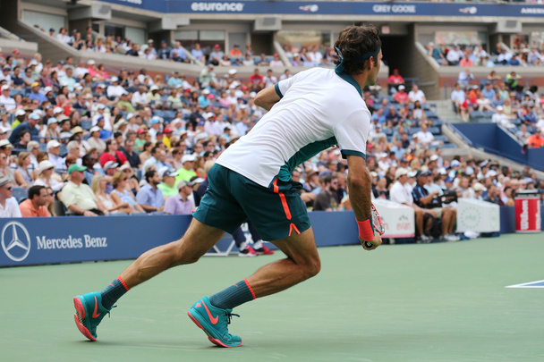 Seventeen times Grand Slam champion Roger Federer of Switzerland in action during his first round match at US Open 2015 - Foto, imagen