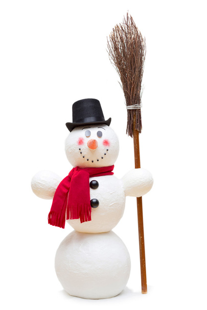 sneeuwpop met rode sjaal en bezem - Foto, afbeelding