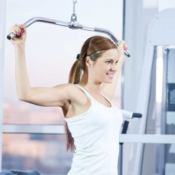 Young woman at the gym - Foto, imagen