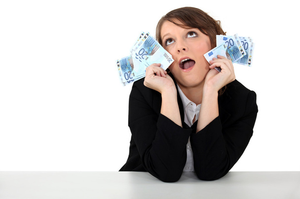 Woman crazy about money - Фото, зображення