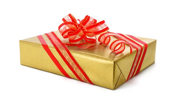 Isolated gold gift box with red bow - Fotoğraf, Görsel