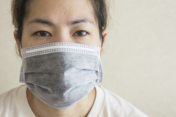 眠い病気女性マスク インフルエンザ冷たい健康概念 - 写真・画像