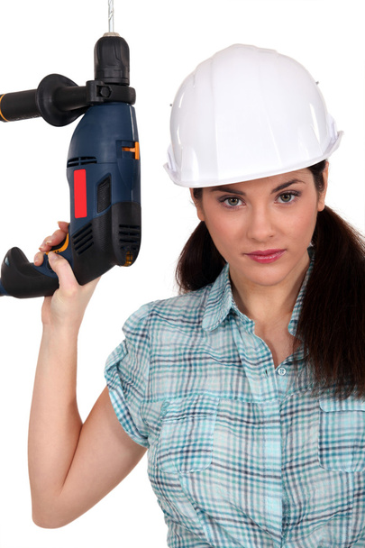 Worker with a power drill - Φωτογραφία, εικόνα