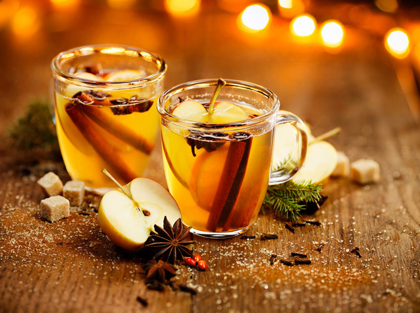 Mulled cider with addition of aromatic spices and citrus fruits - Photo, Image