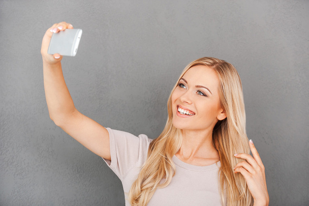 woman making selfie on her smart phone - 写真・画像