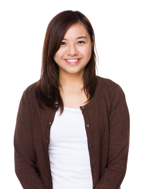 Asian young woman in brown cardigan - 写真・画像