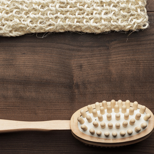 wooden massager brush on the table - Photo, Image