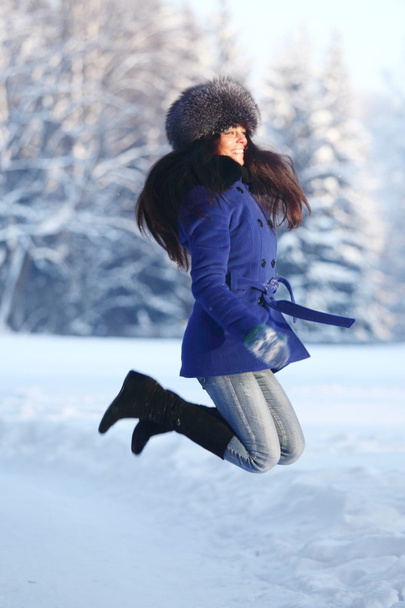 Winter women jump - Fotoğraf, Görsel