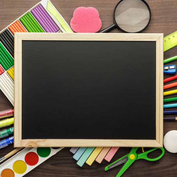 school supplies and blackboard - Foto, Imagem