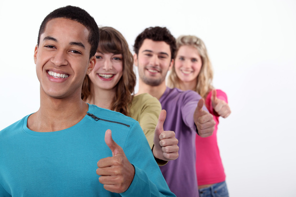 Group of young giving the thumbs-up - Photo, Image