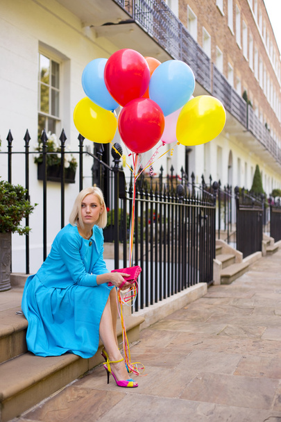 woman with balloons - 写真・画像