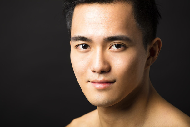 Closeup portrait of attractive young man face - Photo, Image