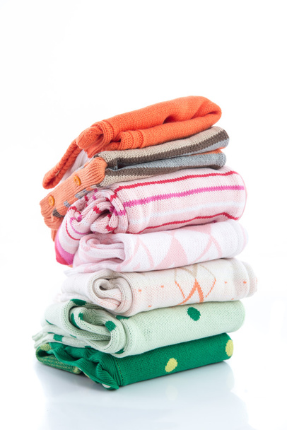 Pilha de camisolas de malha aconchegantes coloridas
 - Foto, Imagem