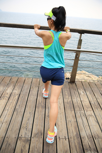 fitness female runner stretching - Photo, image