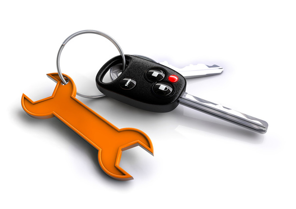 Car keys with orange spanner icon as keyring. Car service and re - Photo, Image