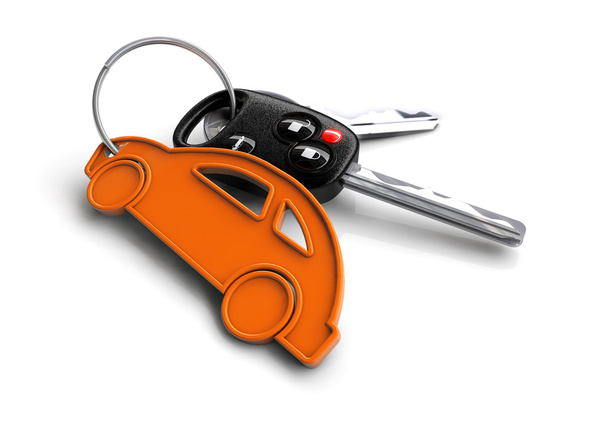 Τα κλειδιά του αυτοκινήτου με πορτοκαλί επιβατικό όχημα εικονίδιο ως ΜΠΡΕΛΟΚ. - Φωτογραφία, εικόνα