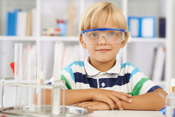 Diligent schoolboy in goggles - Photo, Image