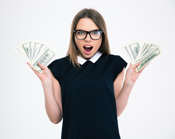 Cheerful woman holding dollar bill - Foto, imagen