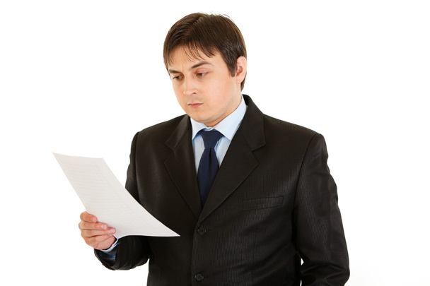 Concentrated businessman checking document - Foto, immagini
