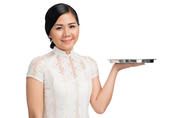 Vietnamese woman with empty metal tray - Photo, Image
