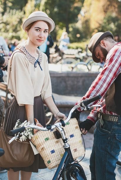 Woman participating in bicycle Retro cruise - 写真・画像