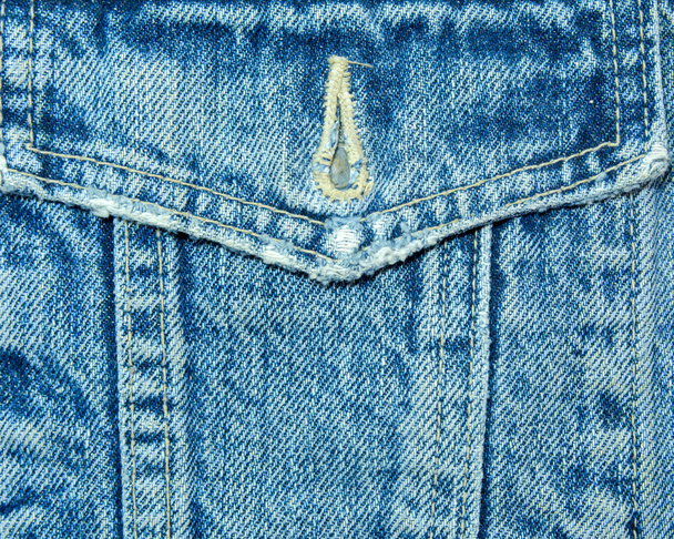 Синя джинсова тканина зі швом
 - Фото, зображення