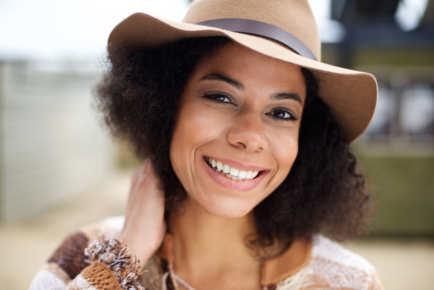 Smiling african american fashion model with hat - Photo, Image