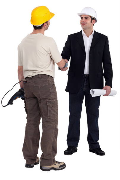 Architect and builder shaking hands - Photo, Image
